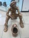 Скульптура «Чистильщик обуви» в ТРЦ Гринвич